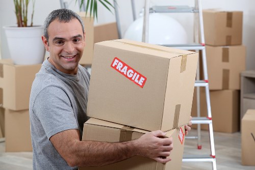Removal van and moving boxes near residential streets in Maida Vale
