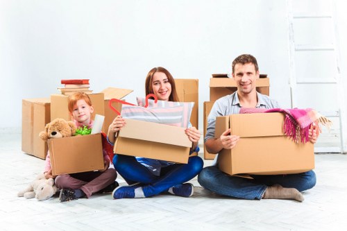 Professional movers working in a Maida Vale residential street