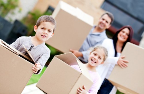 Careful loading of household furniture into a removal vehicle