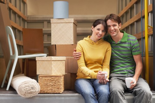 Professional movers handling furniture in a Maida Vale flat
