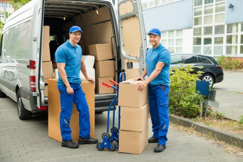 Moving day preparation with packed boxes and a van in Maida Vale