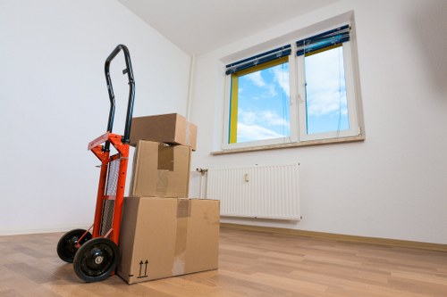 Loading furniture into a moving truck for a Maida Vale home move