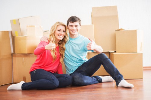 Professional movers handling furniture for a Maida Vale home relocation