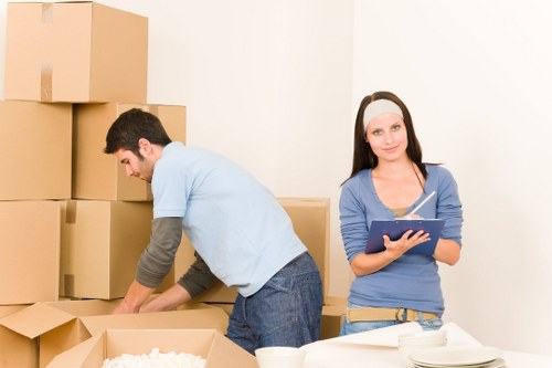 Furniture and packed boxes prepared for transport during a house move