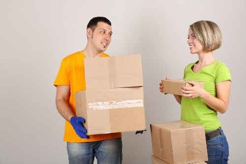 Furniture and boxes being loaded for removal truck hire in Maida Vale