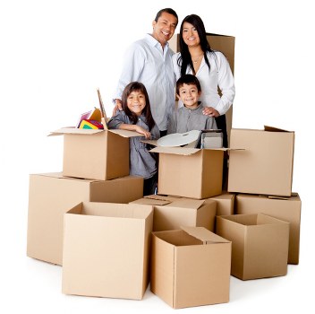 Boxes and furniture loaded into a removals van for transport